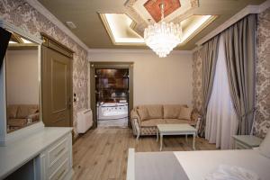 Posezení v ubytování Ervini Boutique Hotel