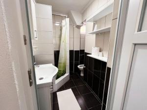 Koupelna v ubytování Apartments Mešić + 25 fotografií