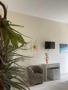 TV a/nebo společenská místnost v ubytování B&B Cafe' Fausu