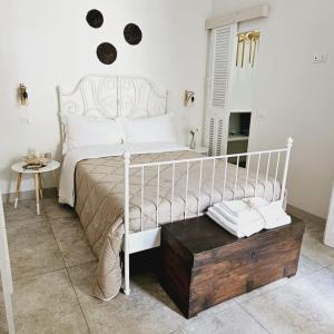 Ένα ή περισσότερα κρεβάτια σε δωμάτιο στο Nel Borgo di San Francesco - Residenza Zafferano