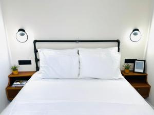Postel nebo postele na pokoji v ubytování Yalla Chorefto - Hotel & Fun