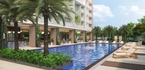 a rendering of a hotel swimming pool with palm trees at Casa Concha by Celandine private residences in Manila +12 photos