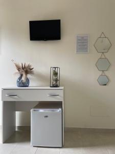 TV a/nebo společenská místnost v ubytování B&B Cafe' Fausu