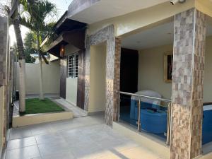 a house with a balcony with a pool at Casa en Santiago por el Homs in Santiago de los Caballeros