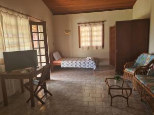 TV a/nebo společenská místnost v ubytování HOTEL FAZENDA BOLANDEIRA