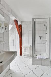 Koupelna v ubytování Hotel & Pension Villa Camenz