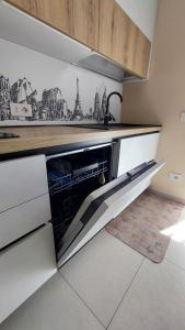 Kuchyň nebo kuchyňský kout v ubytování Nanà Holiday House