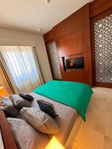 Postel nebo postele na pokoji v ubytování One-Bedroom Apartment at Ancient Sands Golf Resort and Residences, El Gouna