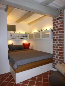 Кровать или кровати в номере Torhaus