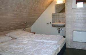 Postel nebo postele na pokoji v ubytování FH Schmetterling am See im hessischen Bergland