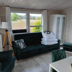 Posezení v ubytování Domki LA MER z własnymi ogródkami- Balia z jacuzzi ,sauna ,rowery, klimatyzacja