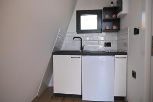 A cozinha ou kitchenette de Horizonti