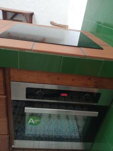 Kuchyňa alebo kuchynka v ubytovaní Casita en el centro con Wifi