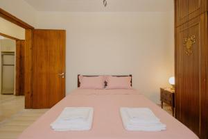 Letto o letti in una camera di Catherine's View