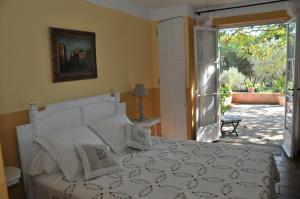 Postel nebo postele na pokoji v ubytování Bastide de l'Avelan