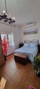 Giường trong phòng chung tại SE ALQUILA CHALET CON PISCINA Y YACUCCI +20 ảnh