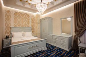 Postel nebo postele na pokoji v ubytování Ervini Boutique Hotel