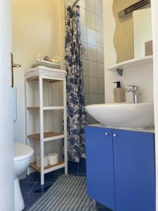 a bathroom with a sink and a toilet at Silba Otium in Silba +118 photos