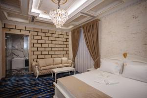 Posezení v ubytování Ervini Boutique Hotel + 37 fotografií