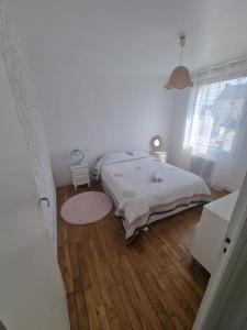 Postel nebo postele na pokoji v ubytování Evene's home
