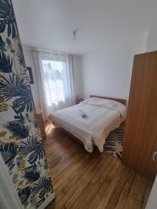 Postel nebo postele na pokoji v ubytování Evene's home