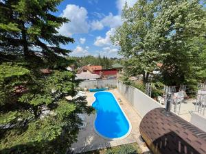 an overhead view of a swimming pool in a backyard at Brvnara Petra in Gornja Toplica +11 photos