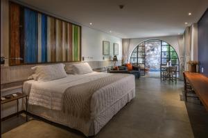 Cama ou camas em um quarto em Hotel Canto das Águas - Roteiro de Charme