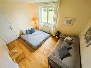 Posezení v ubytování Villa avec piscine et vue panoramique + 9 fotografií