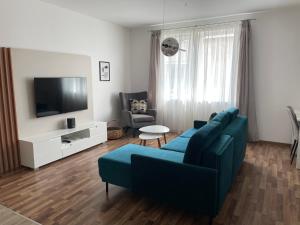 A television and/or entertainment centre at ERKEL 18 APARTMAN