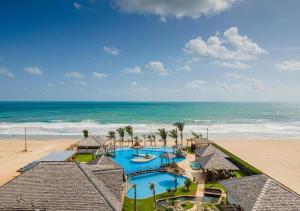 an aerial view of a resort on the beach at The Coral Beach Resort by Atlantica in Trairi