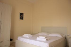 Säng eller sängar i ett rum på Vila Guri i Atos