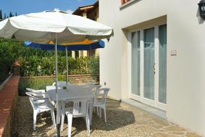 Patio alebo iná vonkajšia časť ubytovania Residenza Le Grillaie