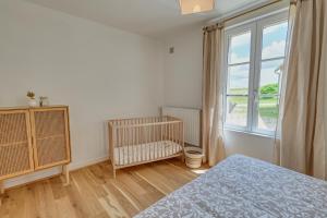 En eller flere senge i et værelse på Le Mousseau - proche du Zoo - tranquillité absolue + 14 billeder