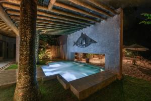 A piscina localizada em Hotel Canto das Águas - Roteiro de Charme ou nos arredores