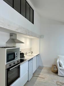 Η κουζίνα ή μικρή κουζίνα στο Maison Jasmin