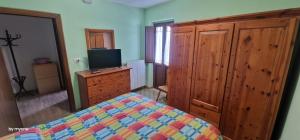 Postel nebo postele na pokoji v ubytování La Baita di Serena