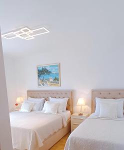 Posteľ alebo postele v izbe v ubytovaní Villa Queen