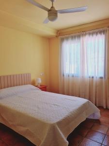 Posteľ alebo postele v izbe v ubytovaní Casa Hurtado de Mendoza pequeña