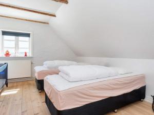 Postel nebo postele na pokoji v ubytování Holiday home Thisted LVIII