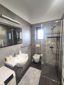 Kúpeľňa v ubytovaní Apartments Norma