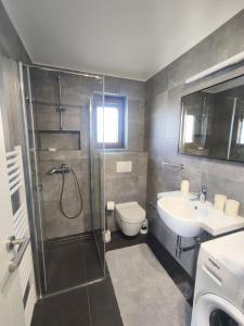 Kúpeľňa v ubytovaní Apartments Norma