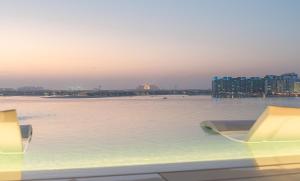 a view of a large body of water with buildings at YOUR STAY APARTMENTS in Dubai