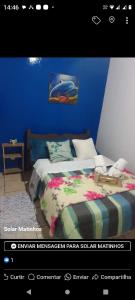 Tempat tidur dalam kamar di Pousada paraíso no Mar