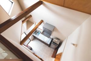 A bed or beds in a room at Attakayama Onsen