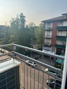 a balcony with a view of a parking lot at JULIET N - Rental rooms Verona in Verona