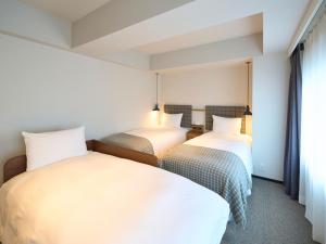 Postel nebo postele na pokoji v ubytování Hotel Resol Stay Akihabara + 37 fotografií