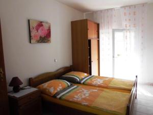 Posteľ alebo postele v izbe v ubytovaní Ferienhaus San Marino