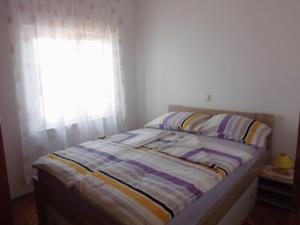 Posteľ alebo postele v izbe v ubytovaní Ferienhaus San Marino