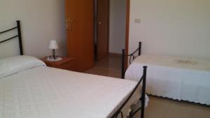 Кровать или кровати в номере Joanne B&B