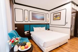 Postel nebo postele na pokoji v ubytování A&D Luxury Hotel
